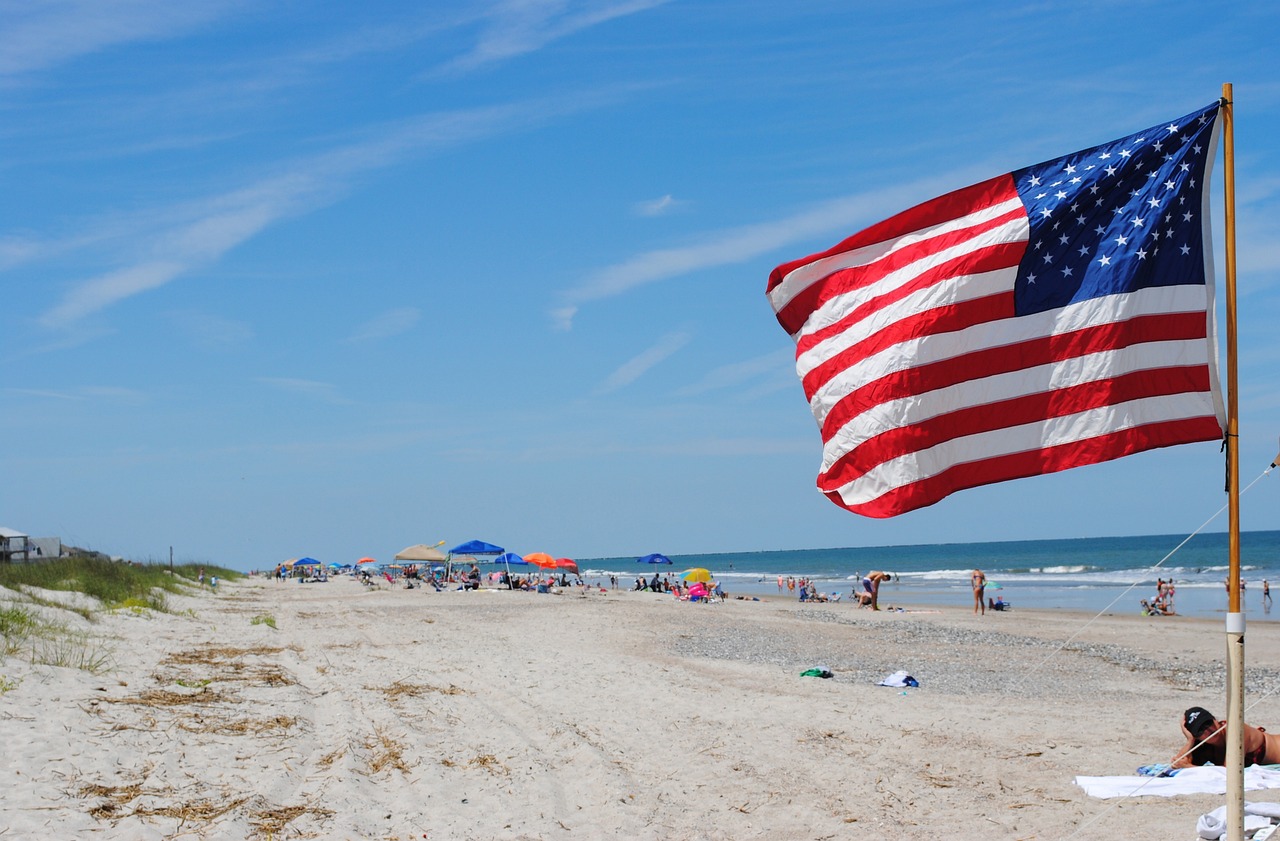 An American flag overlooking the beach